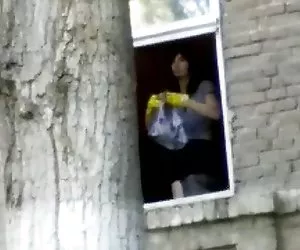 Muchacha en ventana